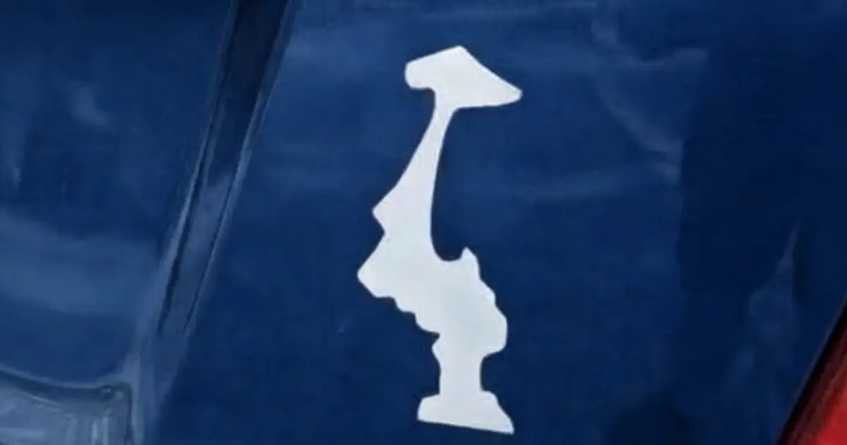 My grandpa spotted this sticker and stopped in his tracks…  He had no idea what it meant, so he took a picture. Now we NEED to know — what is this thing?
